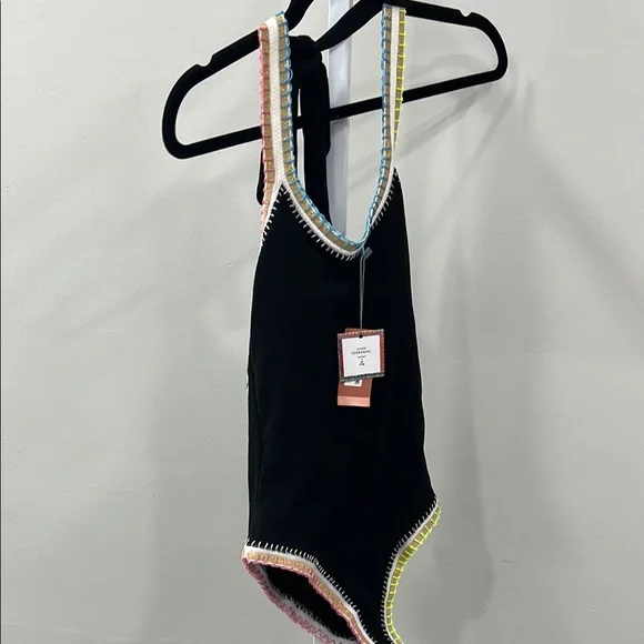 Platinum inspired by Solange Ferrarini Crochet Trim Swimsuit